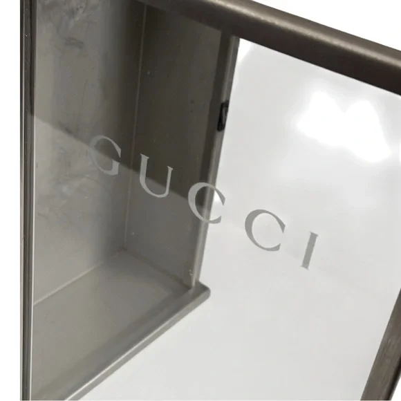 Gucci Made in Italy stainless steel retail counter display merchandise case